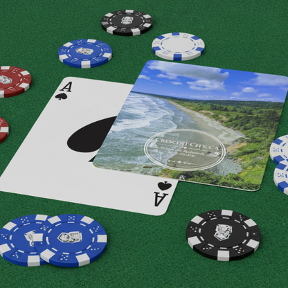 Souvenir playing cards with Crescent City, CA overlook scenic design on a green table with poker chips.