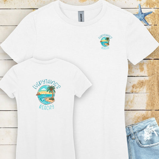 Front and Back of White Women's T-shirt with  picture of island that says Everything's Beachy small version on front  top Pocket spot and large on back.