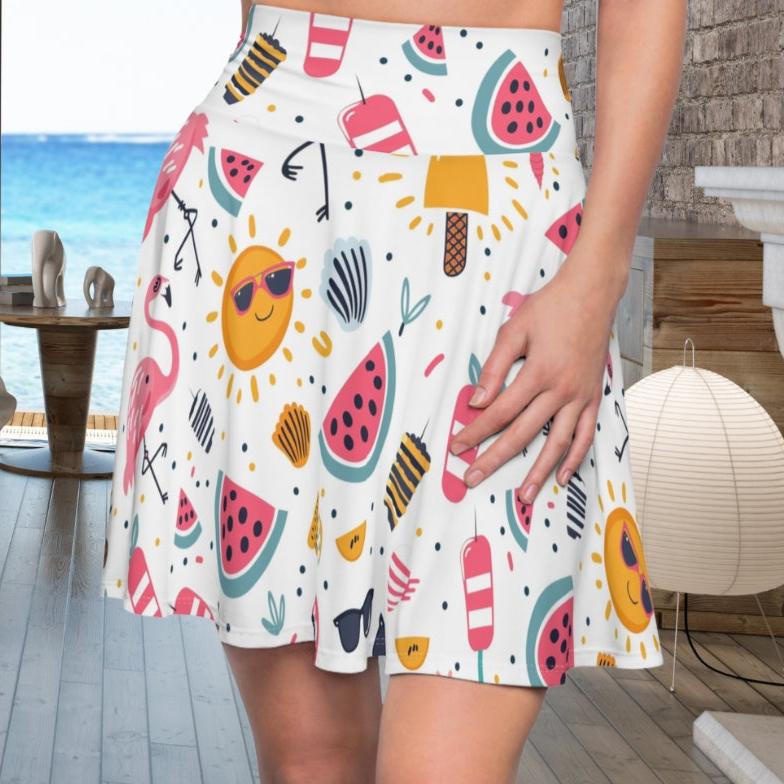 Front of White skater skirt with flamingoes', watermelons, sun, and fun beach graphics.