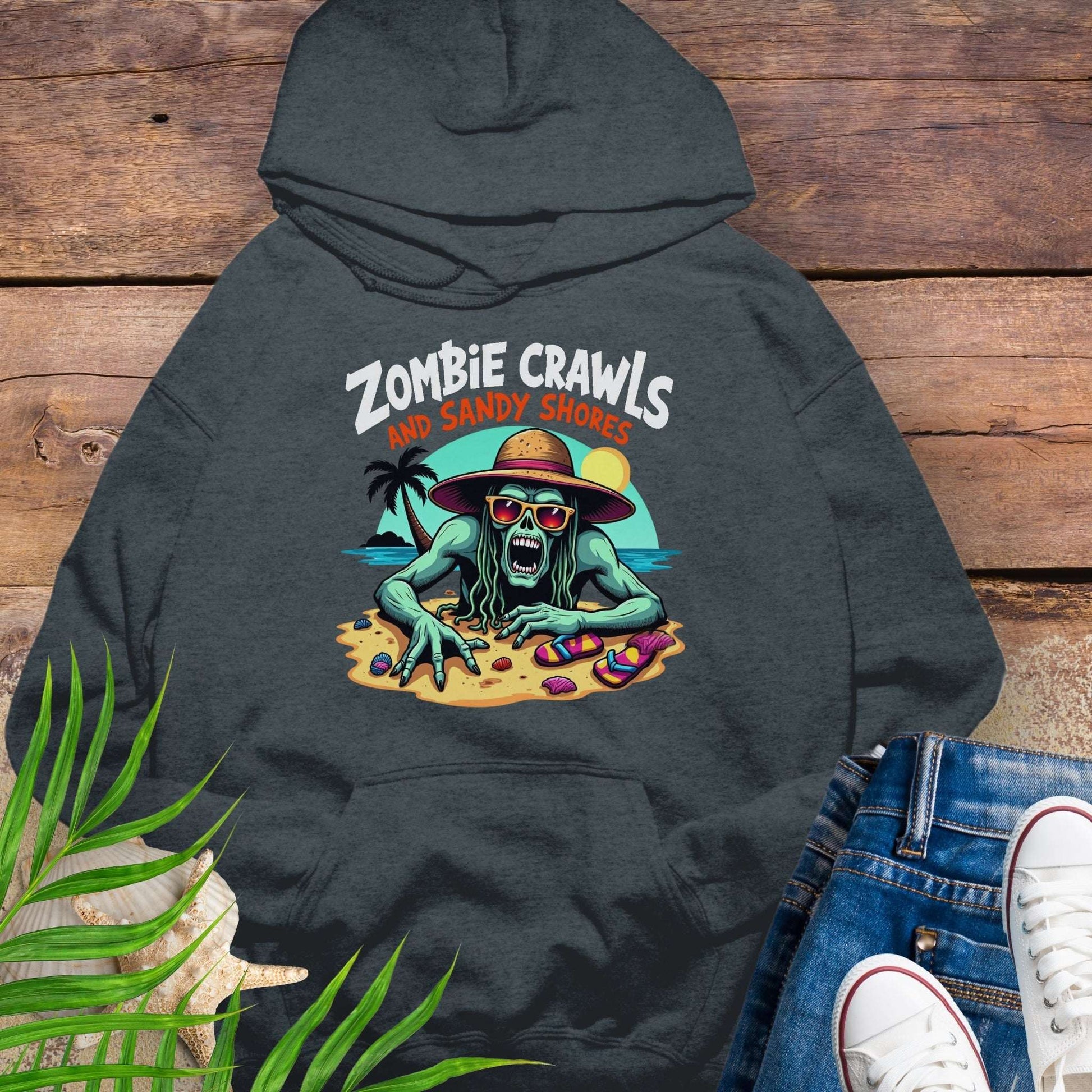 Dark gray hoodie with a zombie graphic and 'Zombie Crawls on Sandy Shores' text on a wooden surface.