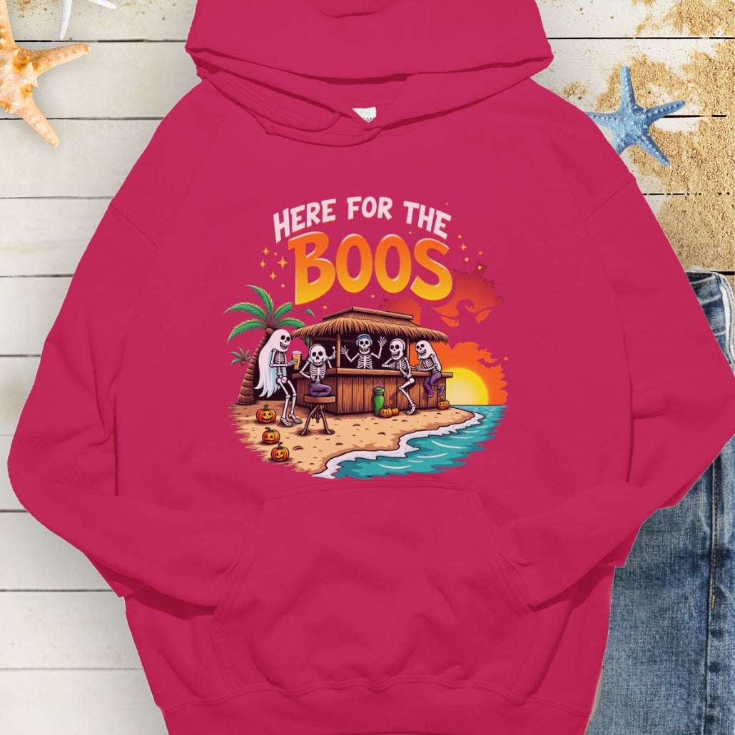 Heliconia Hoodie with Skeletons and ghosts drinking at a tiki bar with the text Here for the Boos