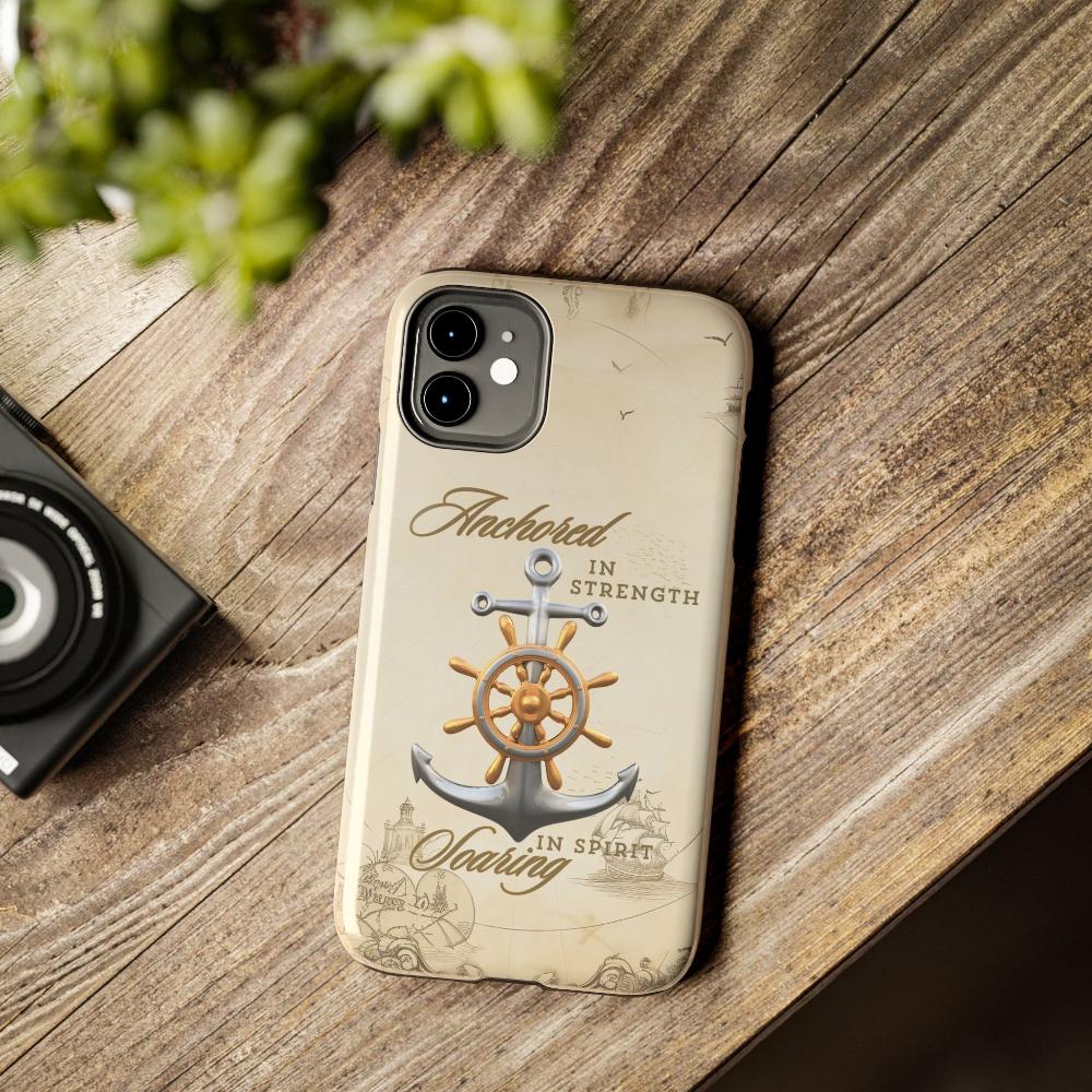 Iphone 11 Cell phone cover Silver Anchor with silver and gold ship wheel on top with text Anchored in strength Soaring in Spirit on beige nautical map background.