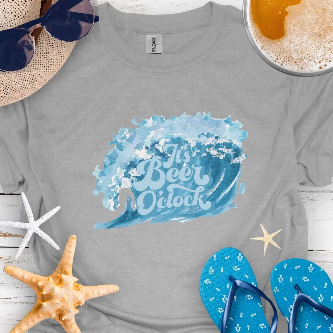 Sport Gray T-shirt with retro text reading “It’s Beer 0’Clock” above an ocean wave graphic.