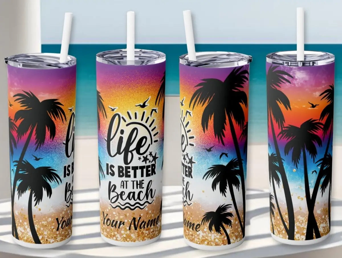 4 skinny 20 oz tumbler from different sides  with vibrant design of beach with text life is better at the beach
