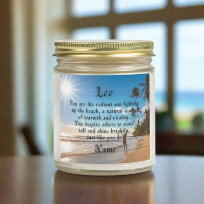 Elegant Leo Zodiac hand-poured coconut apricot wax scented candle in a 9 oz clear glass jar, featuring a picture of the ocean and beach with palm trees and woman raising her hands to the sun with an inspirational quote personalized. A beach-inspired astrology gift, perfect for relaxation and decor.