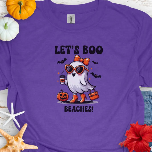 Heather purple with a girl ghost wearing sunglasses, high heels and an orange bow in hair holding a purse and coffee with bats flying around with text Let's Boo Beaches'