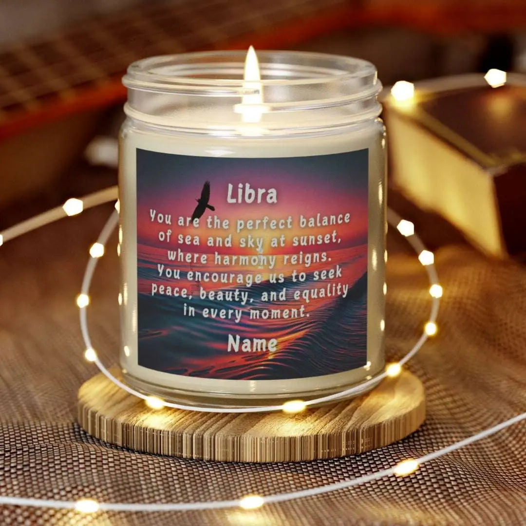 Elegant LIbra Zodiac hand-poured coconut apricot wax scented candle in a 4 oz clear glass jar, featuring a picture of the ocean at sunset with a bird flying and an inspirational quote personalized. A beach-inspired astrology gift, perfect for relaxation and decor.