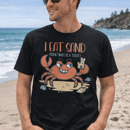 A man wearing a black t-shirt with a cartoon crab design and text 'I Eat Sand (Sometimes as a Treat)'.