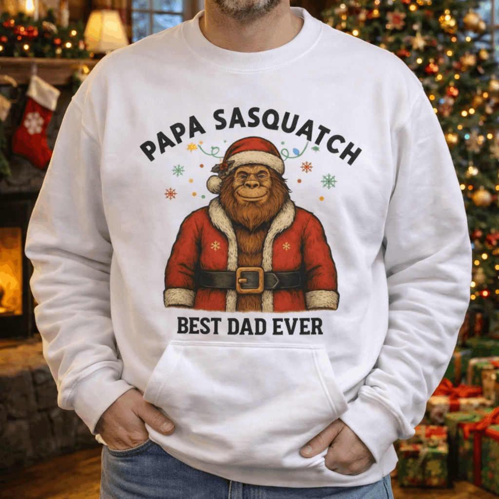 Person wearing a white sweatshirt with 'Papa Sasquatch” Santa Personalized Sweatshirt.