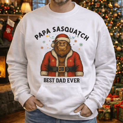 Person wearing a white sweatshirt with 'Papa Sasquatch” Santa Personalized Sweatshirt.