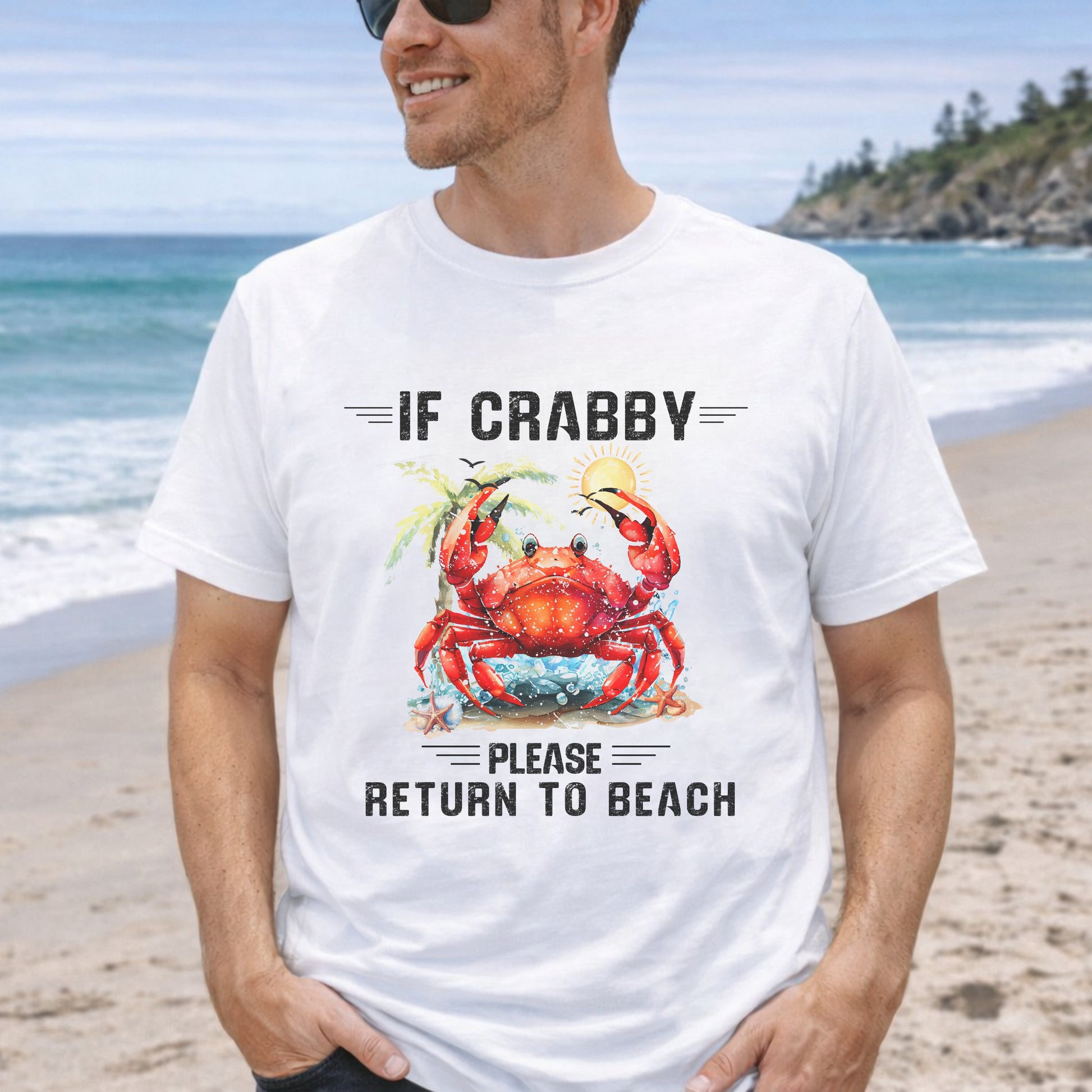 Man wearing white t-shirt with a red crab graphic and text If Crabby Please Return to Beach.