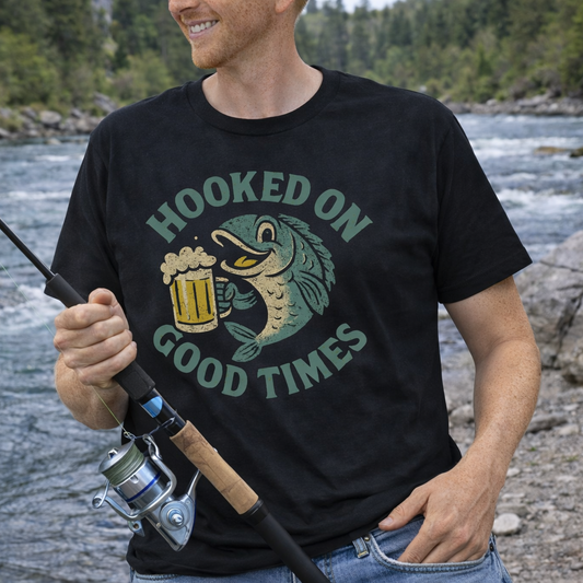 Man wearing a black t-shirt with a fish holding a beer that says Hooked on Good Times.