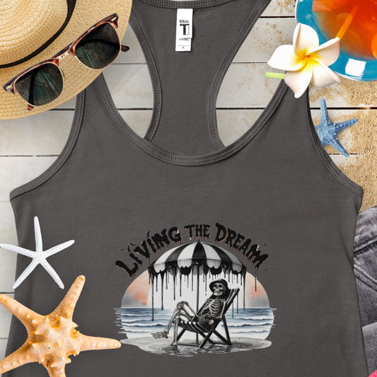 Charcoal Tank Top Skeleton on the beach under an umbrella with text Living the Dream