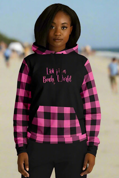 Black hoodies with hot pink and black gingham sleeves, kangaroo pouch, and hood, black background that says Living in a Beachy world in a swirly font.