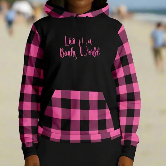 Black hoodies with hot pink and black gingham sleeves, kangaroo pouch, and hood, black background that says Living in a Beachy world in a swirly font.
