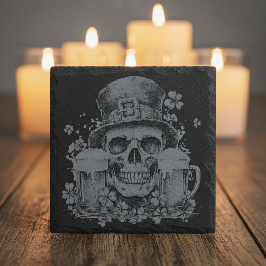 Slate coaster engraved with skull and beer design.
