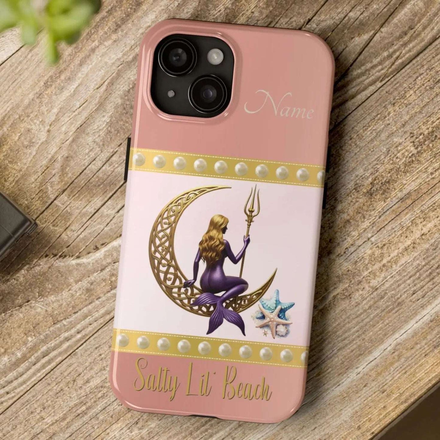 Pink and White 15 iPhone Case with mermaid sitting on a celtic crescent moon holding a trident that says Salty Lil' Beach. Personalized with name.