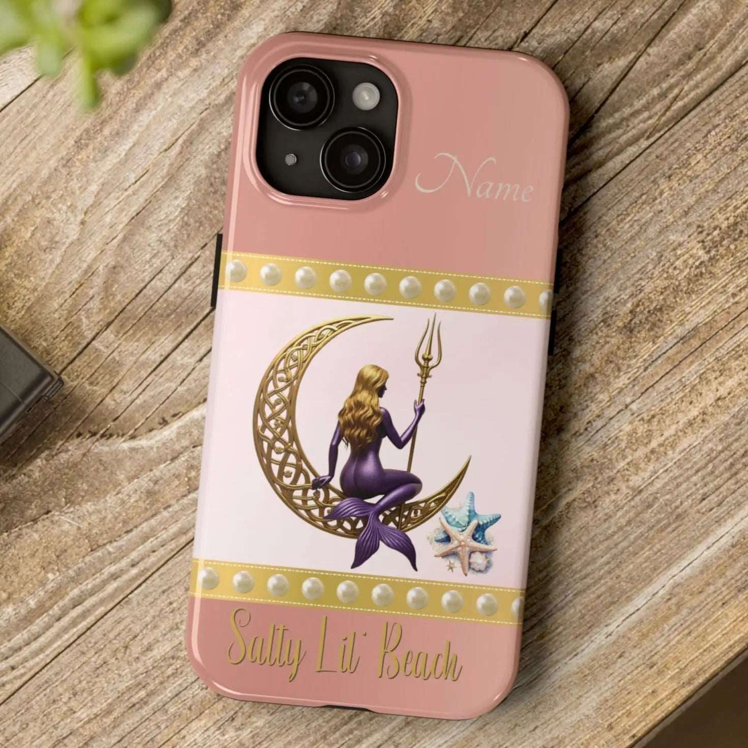 Pink and White 15 iPhone Case with mermaid sitting on a celtic crescent moon holding a trident that says Salty Lil' Beach. Personalized with name.