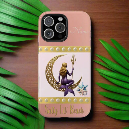 Pink and White 16 Pro Max iPhone Case with mermaid sitting on a celtic crescent moon holding a trident that says Salty Lil' Beach. Personalized with name.