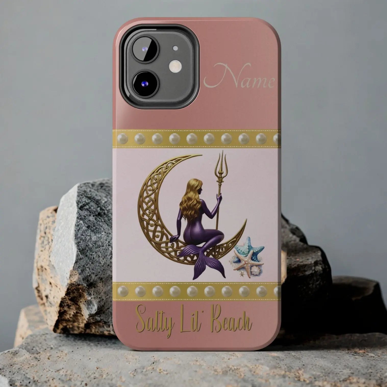 Pink and White 12 Pro Max iPhone Case with mermaid sitting on a celtic crescent moon holding a trident that says Salty Lil' Beach. Personalized with name.
