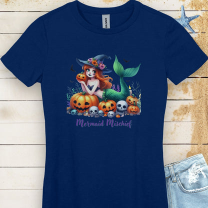 Navy Women's T-shirt with mermaid in witches hat laying in pumpkin patch with text Mermaid Mischief.