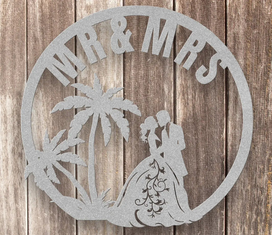 Silver metal Sign with Wedding couple under palm trees with Mr. & Mrs. on top.