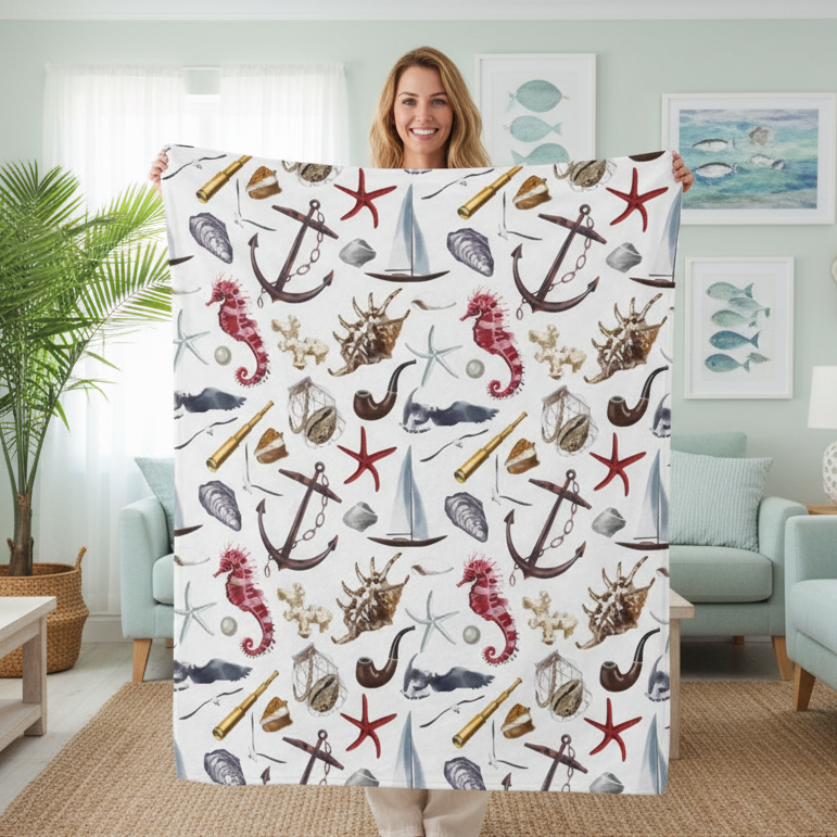 Woman holding a blanket with nautical pattern in a living room