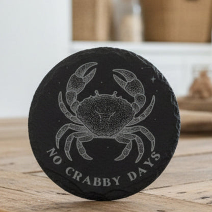Black coaster with a crab design and 'No Crabby Days' text.
