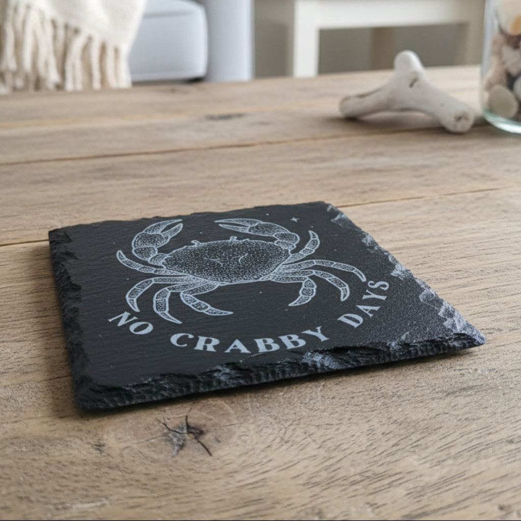Black slate coaster with crab design and 'No Crabby Days' text engraved.