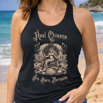Person wearing a black tank top with a mermaid design and text Real Queens Are born Mermaids.