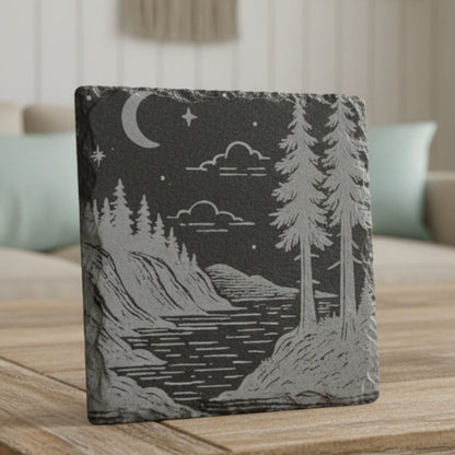 Engraved 4" slate coaster with sea and redwoods design.