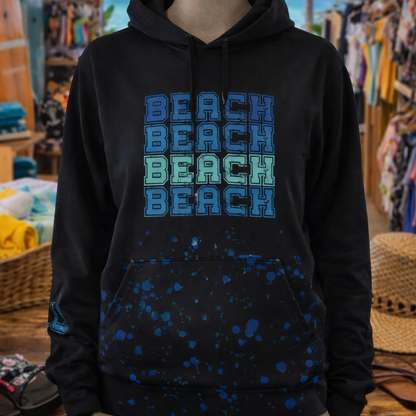 Black hoodie with 'BEACH BEACH BEACH' text in blue on a mannequin in a store.