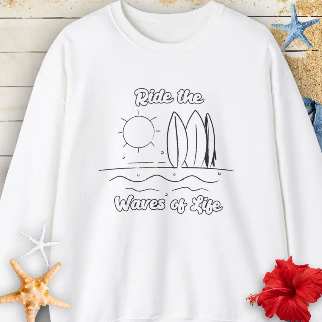 Our Ride the Waves of Life Sweatshirt  in White with Surfboards and the sun line art with the phrase ide the Waves of Life. Perfect for any surfing enthusiast.