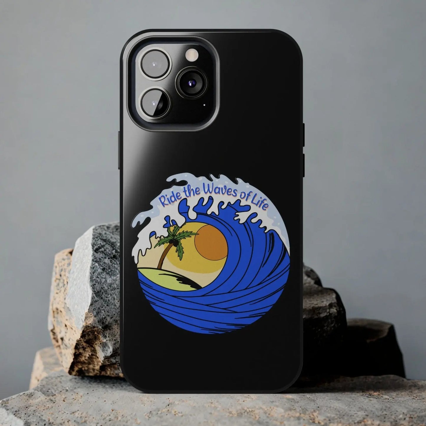 Black iPhone 13 Pro Max Case with wave with sun and palm tree in the middle that says Ride the Waves of Life.