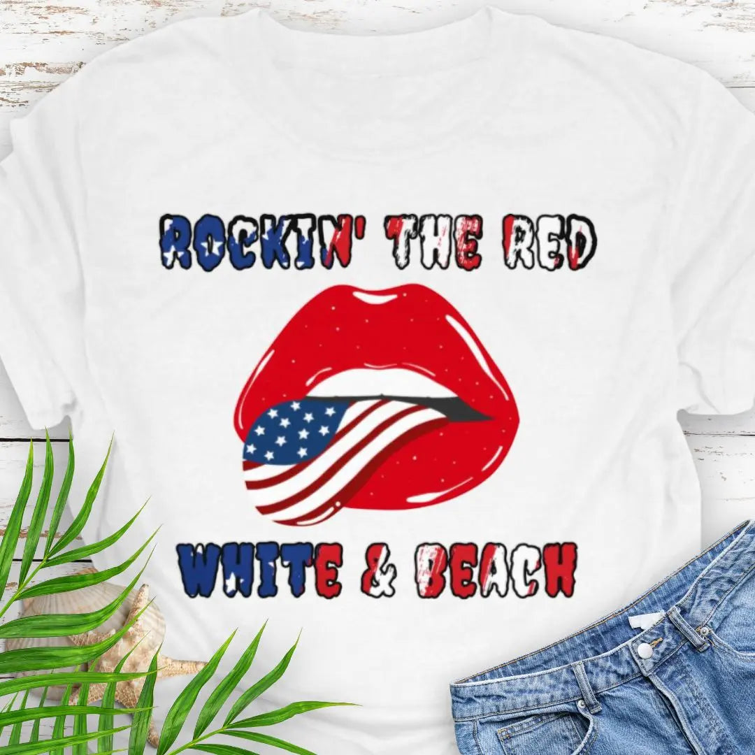 White T-shirt with rolling stones lips with American flag tongue hanging out that says Rockin' the Red, White & Beach with text that is filled with the flag.