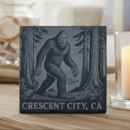 Coaster with a Sasquatch design and 'Crescent City, CA' text engraved.