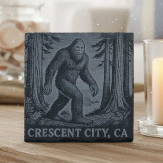 Coaster with a Sasquatch design and 'Crescent City, CA' text engraved.