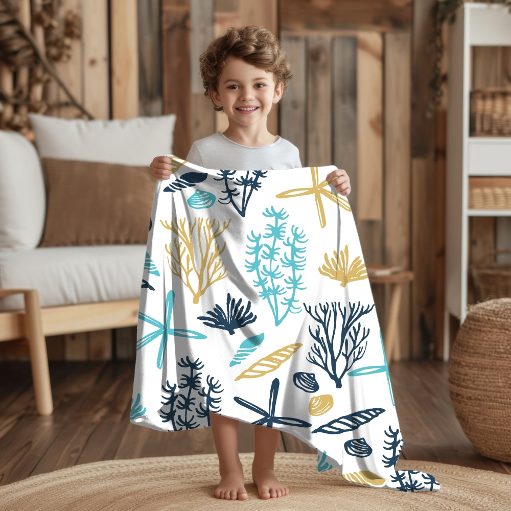 30x40 White velveteen blanket with seashells, underwater plants, starfish in blue and yellows