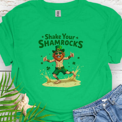 Shop our fun and festive dancing leprechaun in beach attire with shamrock confetti with the text 'Shake Your Shamrocks' Irish Green T-shirt! Perfect for St. Patrick's Day celebrations or anyone who loves a touch of whimsy in their wardrobe.
