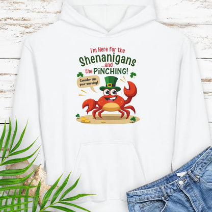 I'm Here for the Shenanigan's and the Pinching White Child Hoodie with a cartoon crab wearing an Irish top hat sitting on the beach holding a sign that says consider this your warning. 