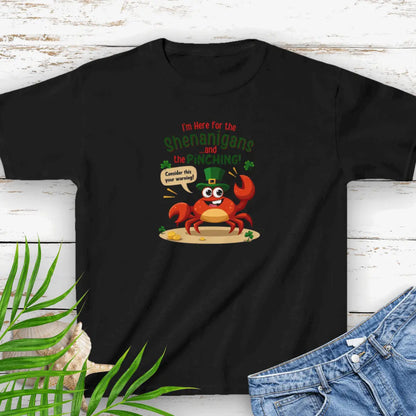 I'm Here for the Shenanigan's and the Pinching Black Small Child T-shirt with a cartoon crab wearing an Irish top hat sitting on the beach holding a sign that says consider this your warning. 