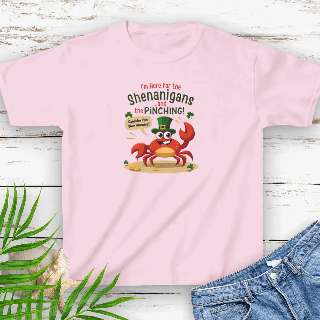 I'm Here for the Shenanigan's and the Pinching Pink Small Child T-shirt with a cartoon crab wearing an Irish top hat sitting on the beach holding a sign that says consider this your warning. 