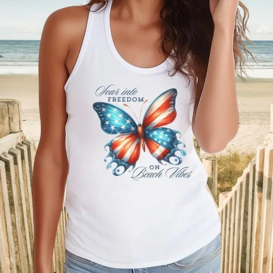 White tank top with red white and blue butterfly with text Soaring into Freedom on Beach Vibes