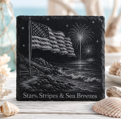 Laser engraved natural slate coaster featuring a patriotic bald eagle, fireworks, lighthouse, and "Land of the Free" with protective padded feet.