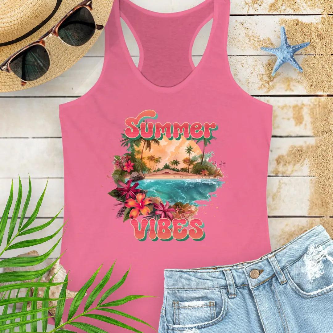 A hot pink racerback tank top with 'Summer Vibes' text and a beach-themed graphic,