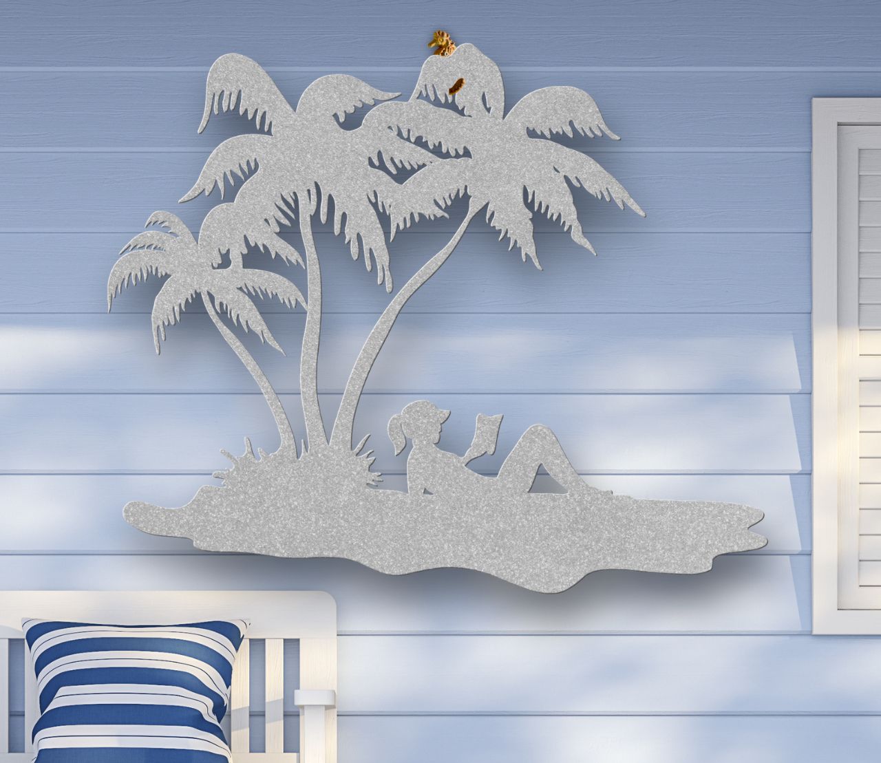Silver Metal wall art of a woman reading under palm trees on the beach, sunbathing in a tropical scene, crafted from steel and available in multiple sizes and colors.
