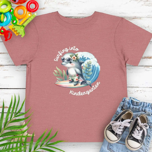 Surfing Into Kindergarten Heather Mauve Toddler's T-shirt with a fun dolphin surfing.
