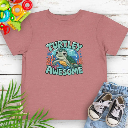 Turtley Awesome Toddler's Heather Mauve T-shirt with cartoon sea turtle underwater.