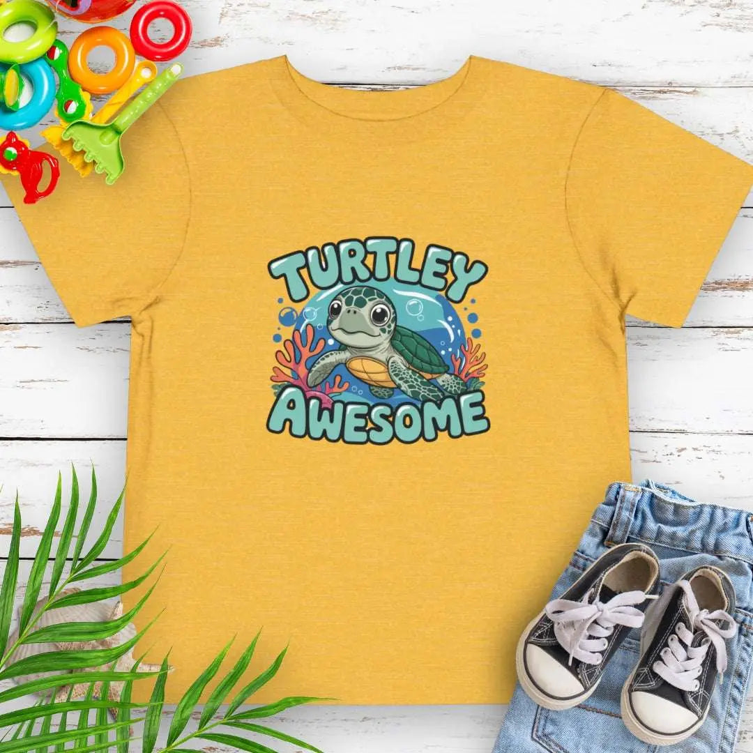 Turtley Awesome Toddler's Yellow T-shirt with cartoon sea turtle underwater.