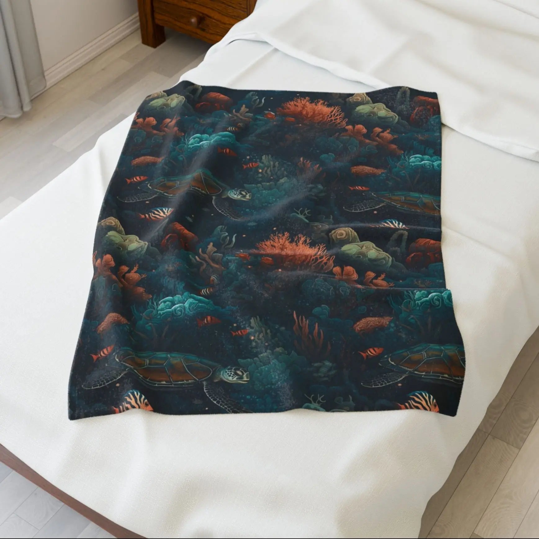 Our Velveteen 30x40" Plush Blanket with a dark underwater scene with coral, fish and sea turtles.